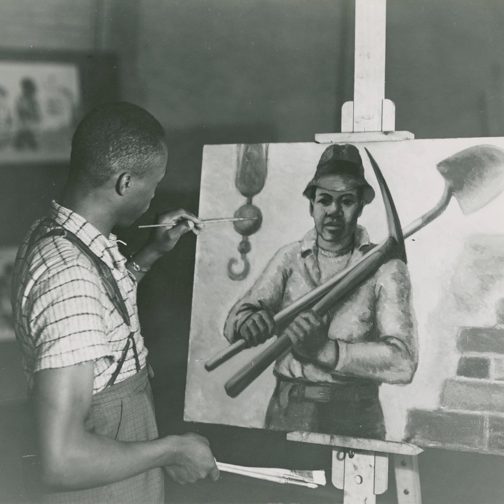 John C. Lutz at work on a smaller painting